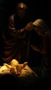 a nativity scene of a baby jesus in the manger